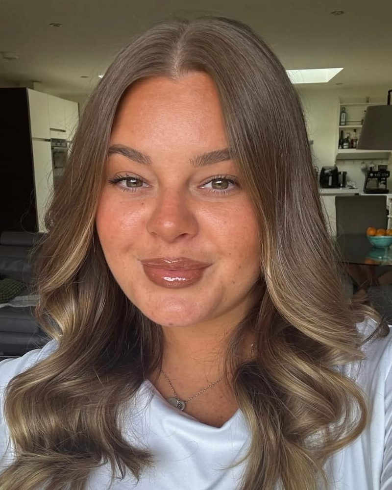 a headshot of a hair stylist